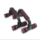 Black and red Fitness Push-Ups Stand Bars with non-slip foam grips. Sturdy push-up stands for enhanced upper body workouts and stability.