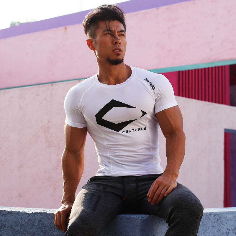 White compression running shirt with bold black logo. Designed for breathability and sweat absorption during workouts.