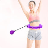 Woman using a purple Adjustable Fitness Ring for exercise. Features a weighted ball for enhanced fat loss and core strengthening.