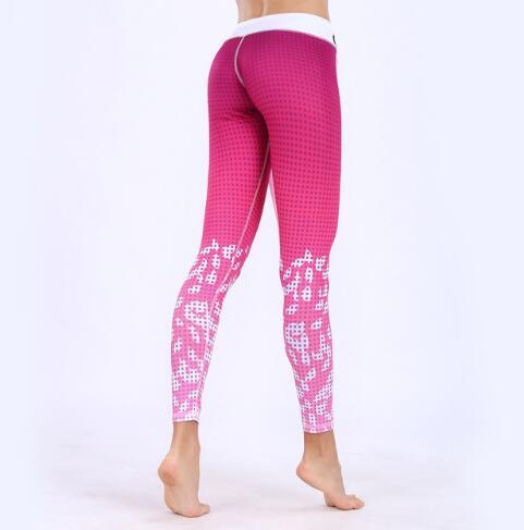 Women gym leggings with a pink gradient design, featuring moisture-wicking fabric and four-way stretch. Ideal for yoga, running, and fitness workouts.