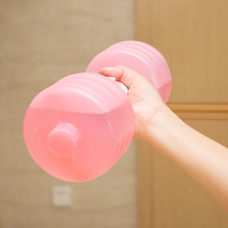 Close-up of a pink water dumbbell filled with water for adjustable weight. Great for home fitness and travel-friendly workouts.