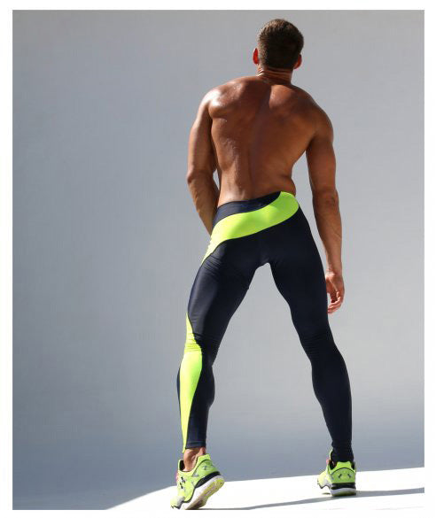 Men's sports pants with tight stretch fit, breathable nylon fabric, and stylish neon accents. Ideal for fitness, running, and gym workouts.