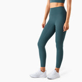 Dark green high-waisted yoga pants with a slim fit and moisture-wicking material. Designed for comfort and flexibility during workouts.