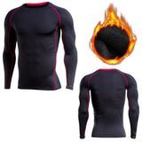 Men's fitness clothing featuring a black long-sleeve compression shirt with red stitching. Made from polyester and spandex for durability and flexibility.