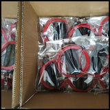 Bulk packaging of red and black jump ropes in plastic bags. High-quality fitness equipment for cardio and endurance workouts.