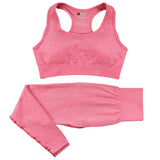 Coral pink women’s high-waist gym set with a seamless sports bra and leggings. Quick-dry, stretchy fabric for comfortable workouts and activewear.