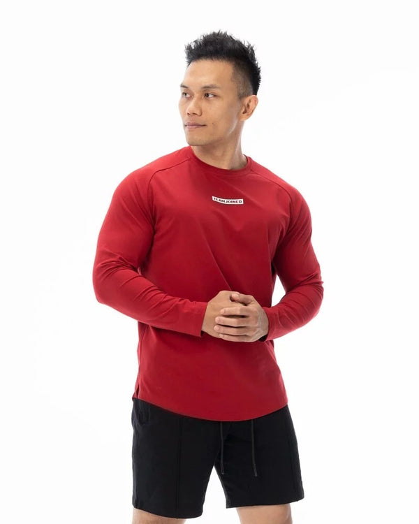 Men's fashion long sleeve sports T-shirt in red, designed for fitness and activewear. Made from breathable polyester, available in M to XXXL sizes.