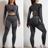 Gray seamless yoga pants and long sleeve top set. Butt-lifting, high-waisted leggings with stylish design for workouts.