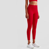 Red slim fit yoga pants with a high waist and breathable fabric. Designed for comfort and flexibility during workouts. Multiple sizes available.