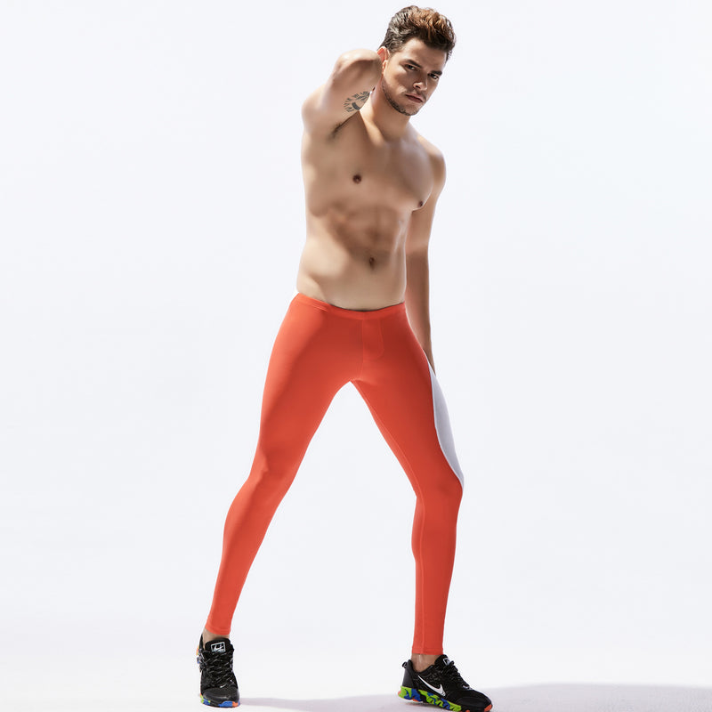 Men's sports pants - fitness stretch tights in breathable nylon. Ideal for running and gym workouts, available in multiple colors.