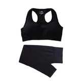 Black women’s gym tracksuit set with a seamless sports bra and high-waist leggings. Quick-dry, breathable fabric for fitness and workout sessions.