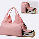 Pink women's large yoga bag with a separate shoe compartment, ideal for keeping workout gear organized and clean.