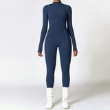 Navy blue long-sleeve yoga jumpsuit with a front zipper. Designed with moisture-wicking polyester for warmth and flexibility during workouts.