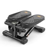 Black mini stepper with LCD monitor and textured foot pedals, designed for home workouts with adjustable resistance and compact design.