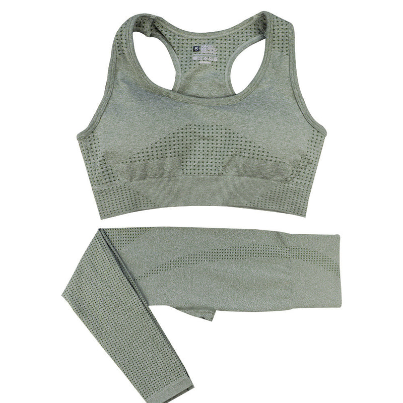 Olive green women’s gym tracksuit set with a seamless sports bra and high-waist leggings. Quick-dry, breathable fabric for fitness and activewear.