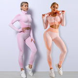 Pink and peach seamless sport sets for women. Quick-dry yoga suits with zip-up jackets and high-waisted leggings, perfect for activewear.