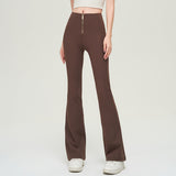 High waist slimming trousers in brown with a front zipper. Made of solid color nylon, these fashion-forward pants offer a flattering fit.