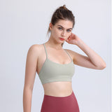 Light green Sling Yoga Fitness Bra for women, featuring a sleek design. Perfect for summer workouts, available in multiple sizes.