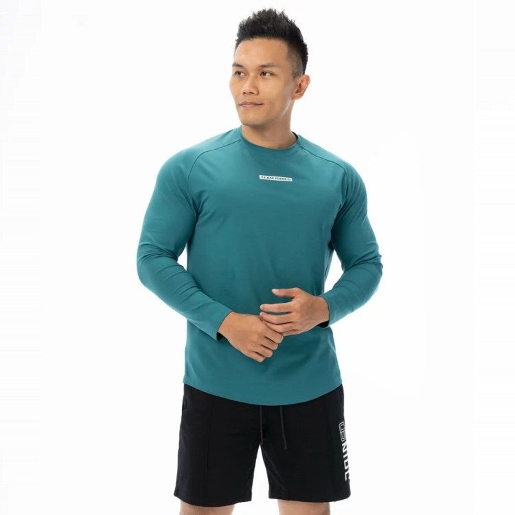 Men's fashion long sleeve sports T-shirt in teal, perfect for gym and outdoor activities. Made from breathable polyester, available in M to XXXL sizes.