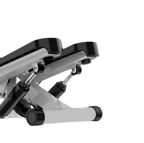 Close-up side view of hydraulic mini stepper exercise machine, showcasing sturdy metal structure and dual hydraulic system for smooth stepping motion.