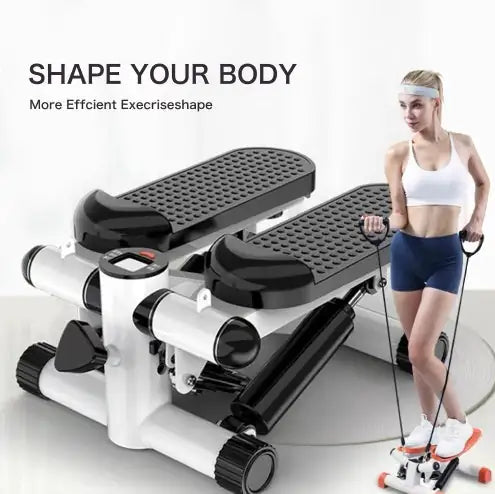 Woman using a mini stepper with resistance bands for a full-body workout. Hydraulic fitness stepper with LCD monitor for tracking exercise progress.